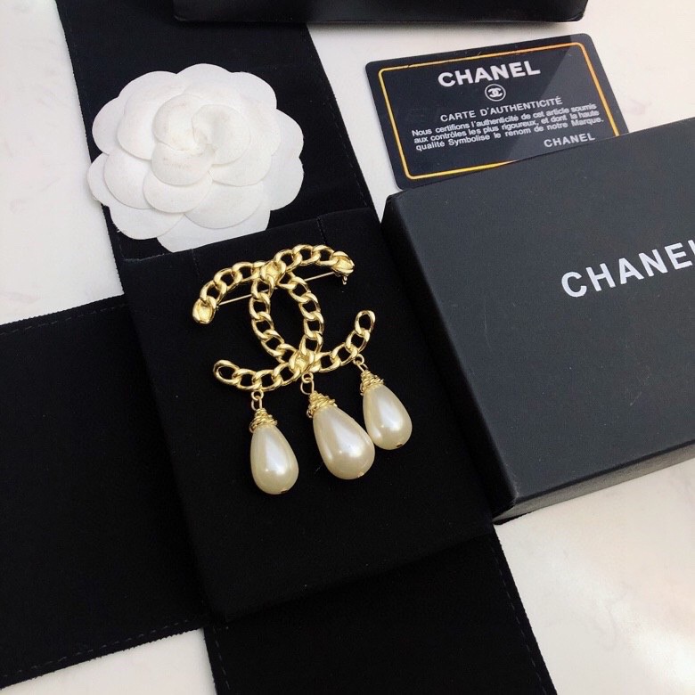 Ch*el brooches